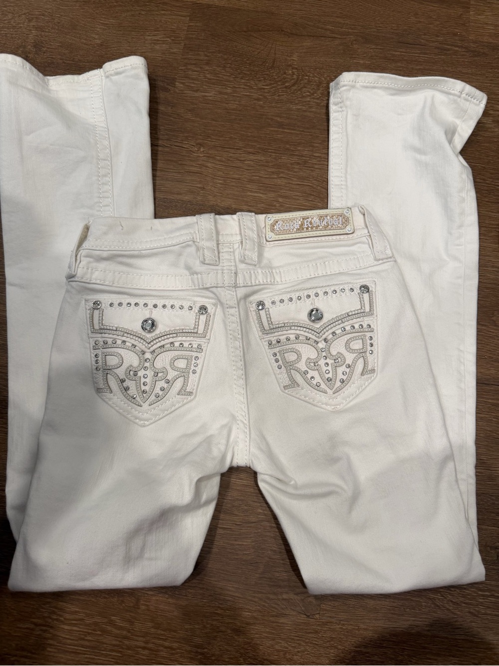 Rock Revival White Boot Cut Jeans with Rhinestone Pocket Detail